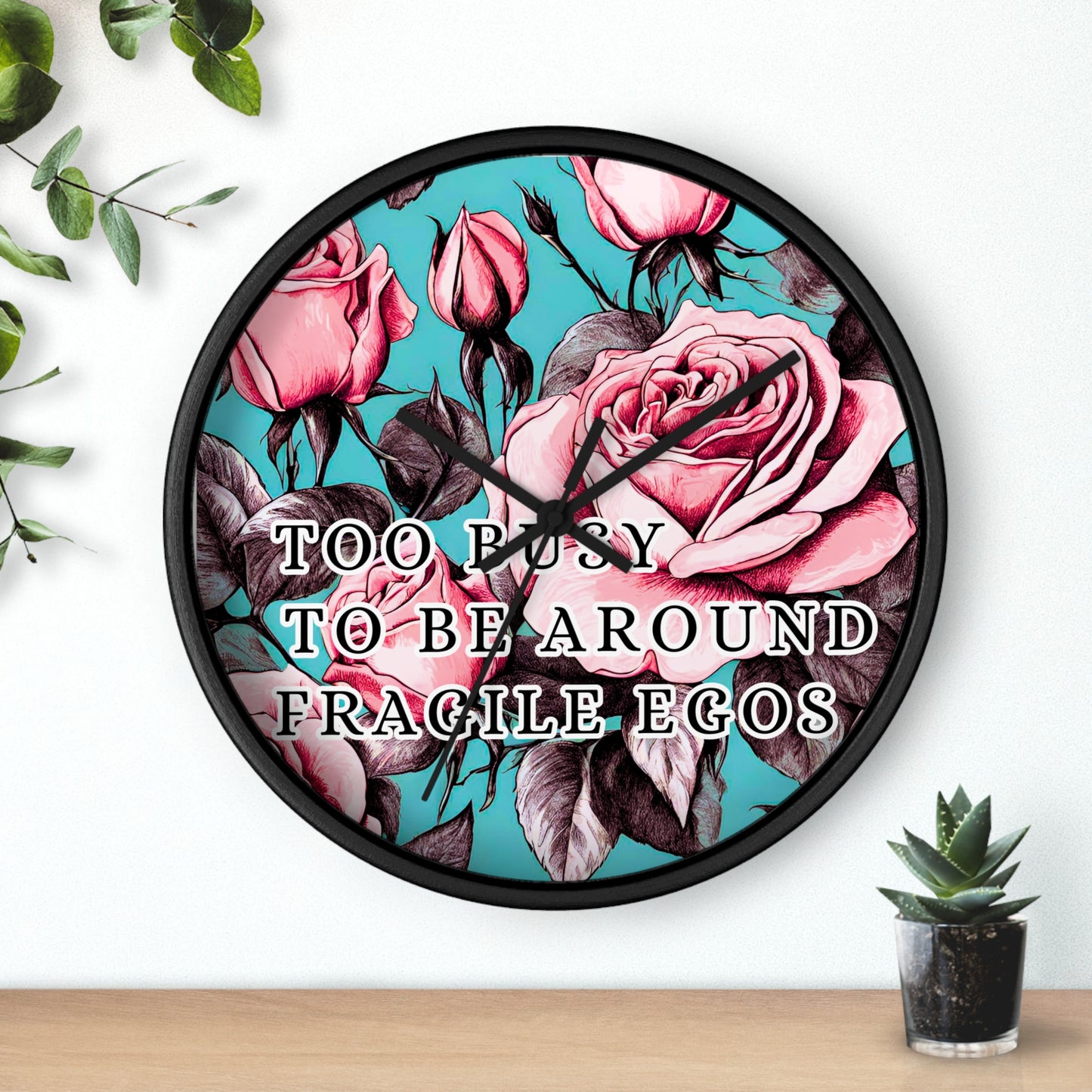 FRAGILE EGOS Wall Clock